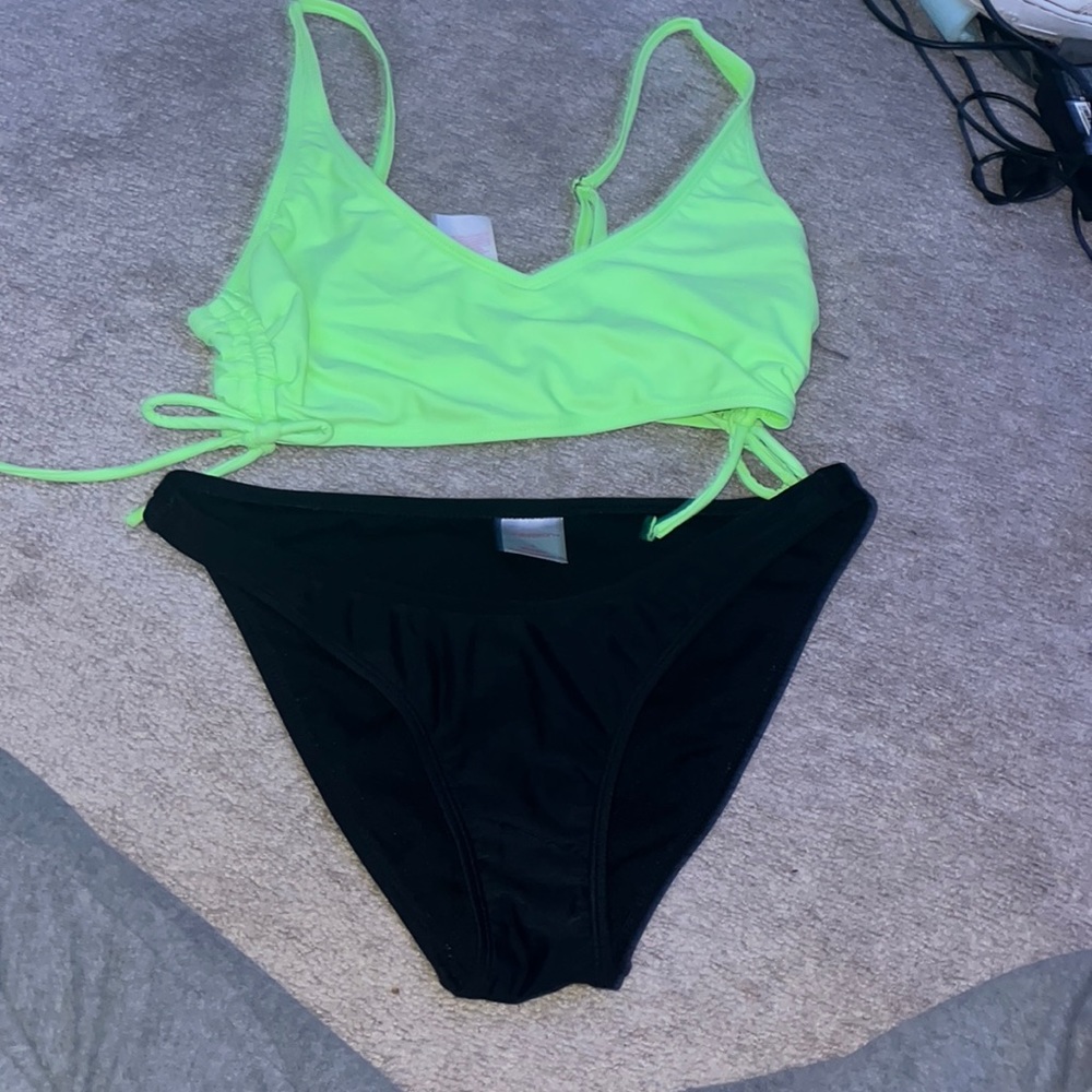 Green too and black bottoms size: S
